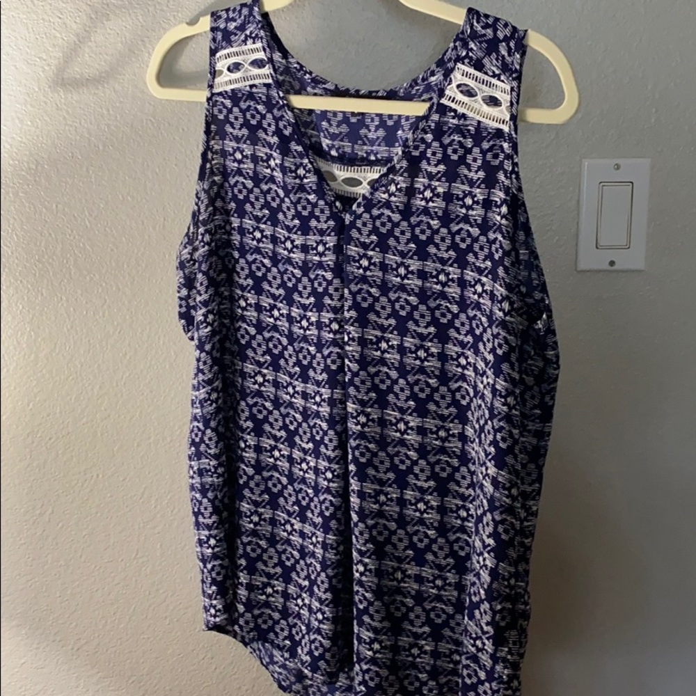 Modern, loose fitting tank with detail
